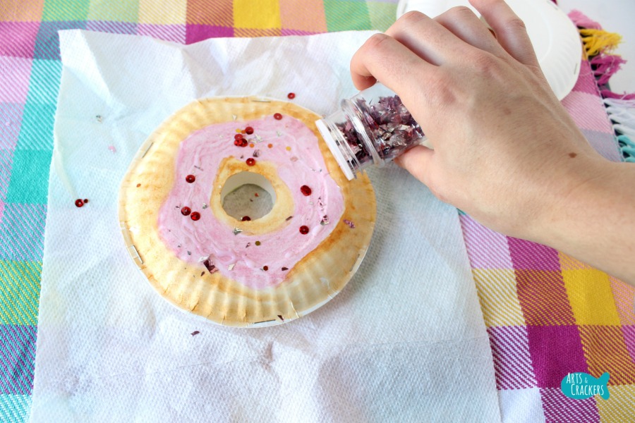 Make the day a little sweeter with this 3D Paper Plate Doughnut Craft for Kids | Teachers | Class Activities | Art Projects for Kids | Kids Crafts | National Doughnut Day | Doughnut Art | Paper Plate Crafts | Doughnut Crafts